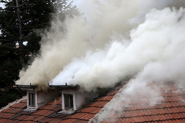Smoke Pouring Out of Roof
