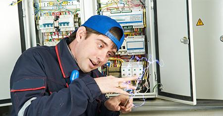 man getting shocked from fuse box