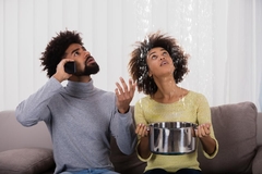 Water Dripping From Ceiling: 7 Common Causes and What to Do