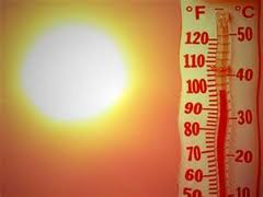 sun shinning on a thermometer