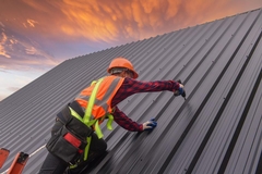 Metal vs. Asphalt Shingles: A Comprehensive Guide to Choosing the Right Roof for Your Home
