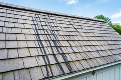What Causes Black Streaks on a Roof?