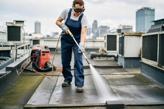 Cleaning Flat Roofs to Prevent Drainage Problems