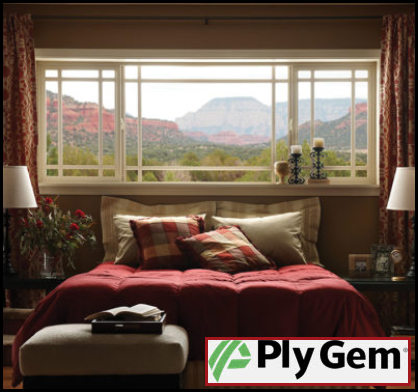 Bedroom interior with Ply Gem cream vinyl windows over bed
