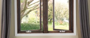 closeup of bottom section of 2 PlyGem casement windows from interior