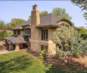 Edco metal roof in brown on two-story home