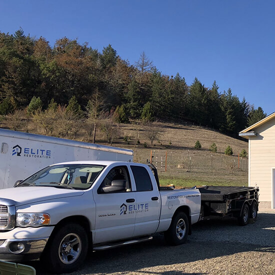 Elite Restoration Vehicles On-Site of Loss