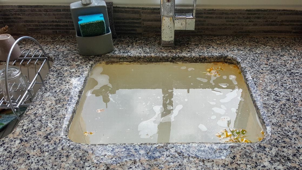 'Why Is My Kitchen Sink Not Draining and How to Fix It Featured' Thumbnail