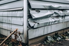 Wind Damage to Aluminum Siding and Repairs